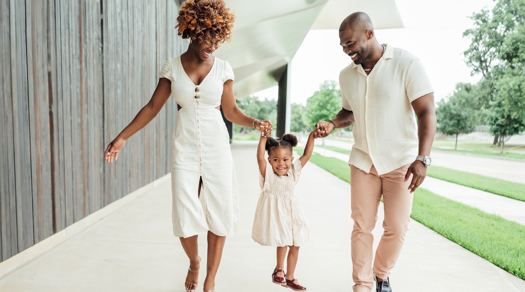 a family walking down the street
