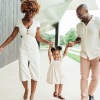 a family walking down the street